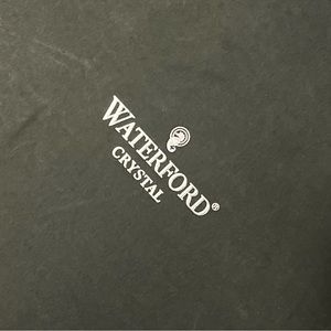 Stunning pair of special occasion Waterford Champagne Flutes in hinged box.